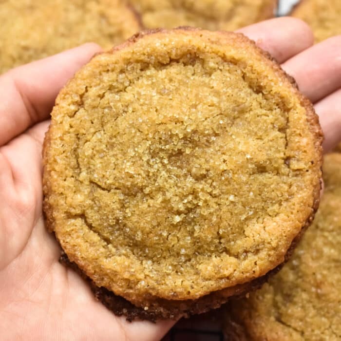 Peanut Butter Miso Cookies being held on a hand