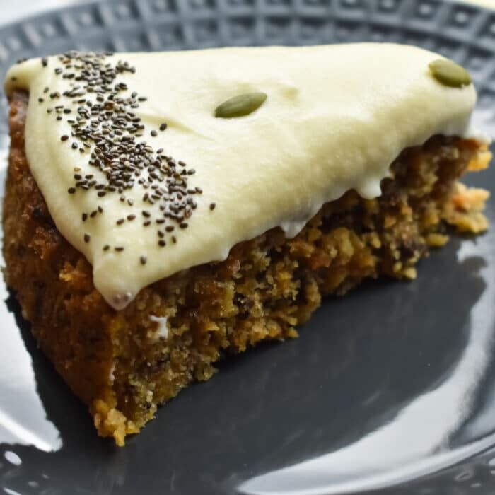 gluten free quinoa carrot cake on a gray plate